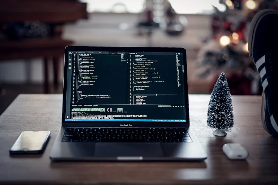 A contemporary workspace showcasing a laptop, tablet, and smartphones, ideal for tech and freelance use.